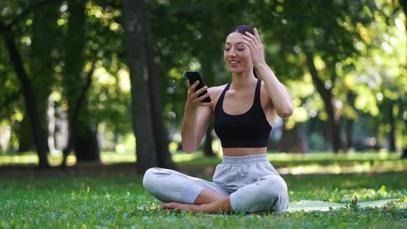Girl Listening To Music in Lotus Position