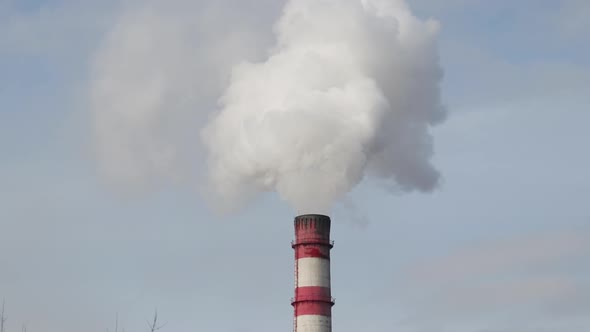 Smoke Pollution From Smokestack Against Sky