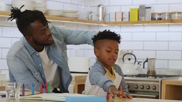 Father and son at home