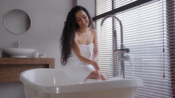 Attractive Young Happy Woman Taking Bath Washing Hands Under Running Hot Water Pretty Smiling Girl