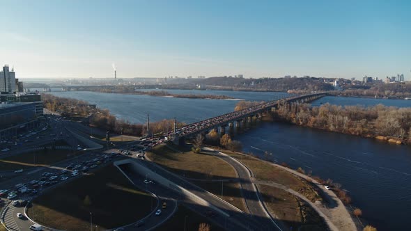 City Traffic on the Big Bridge at the Autumn Aerial View