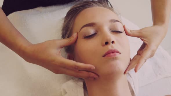 Woman Gets Facial and Head Massage in Luxury Spa