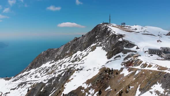 Aerial Drone View on Snowy Peaks of Swiss Alps. Switzerland. Rochers-de-Naye Mountain Peak