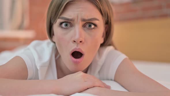 Close Up of Disappointed Creative Young Woman Feeling Shocked