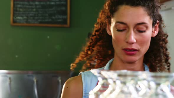 Female staff working at counter