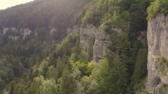 Showing the via ferrata "ladders of death" in france from the drone perspective. It is on the right