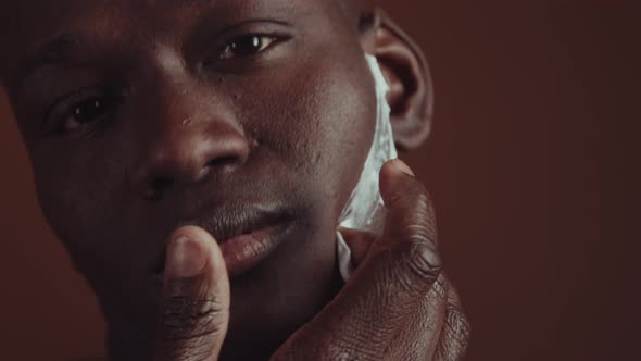 Man Applying Face Cream