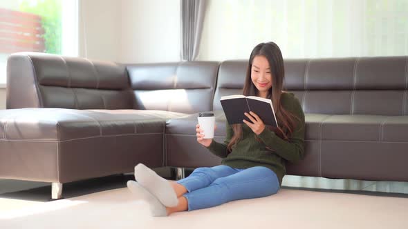 Young asian woman read book