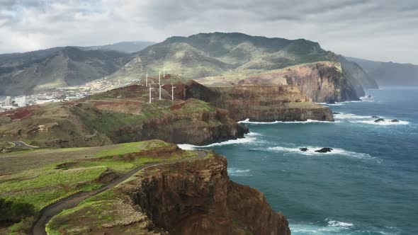 Aerial Footage of Natural Beauty with High Volcanic Cliffs and Turquoise Ocean