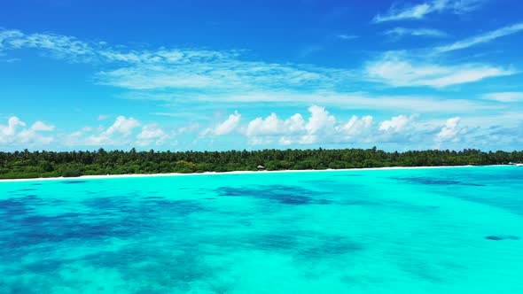 Wide above island view of a summer white paradise sand beach and blue sea background