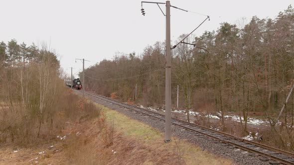 View of an Antique Restored Steam Locomotive Blowing Smoke Vehicle Traveling