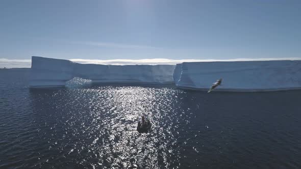 Tourist Boat Among Antarctica Ocean. Aerial Shot