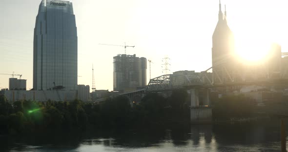 Nashville skyline by the Cumberland River at sunset