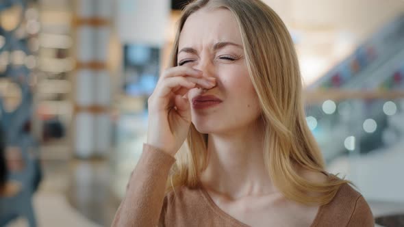 Portrait Young Caucasian Woman with Rhinitis Runny Nasal Virus Illness Sneezes Wipes with Paper