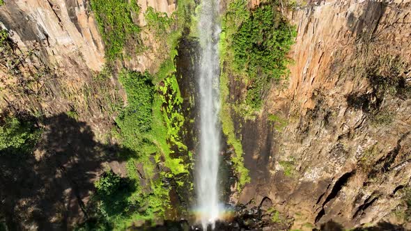 Slow motion waterfall at gorge canyons formation. Rural landscape.