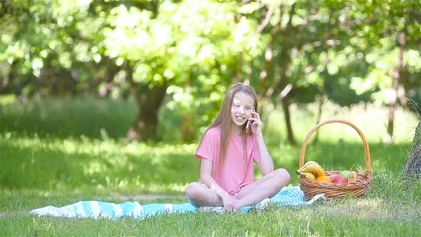 Little Girl in Yoga Position in the Park.