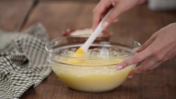 Adding Flour To the Dough. Process of Preparation Cake Batter