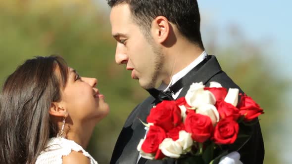 Bride and groom at wedding kiss