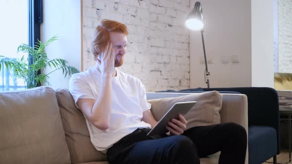 Tired Casual Man Using Tablet with Headache, Pain