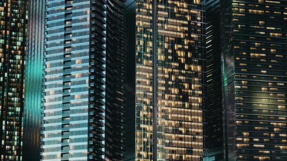 Aerial View of Glowing High Rise Buildings Big City alt