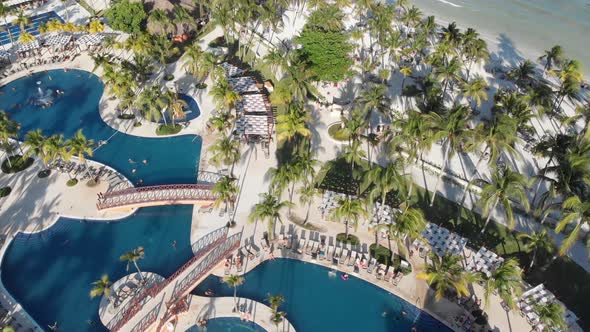 aerial of high-end Mexican resorts that dot the landscape of Riviera Maya, México.  Lush landscaping