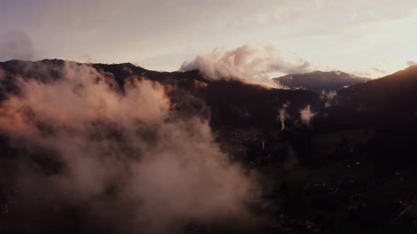 Panoramic View of a Picturesque Mountain Valley with a Village in a Lowland