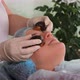 Woman receiving snails treatment at spa salon. Snails slime for skin care. - VideoHive Item for Sale