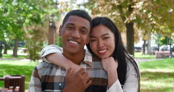 Cute Multiethnic Loving Heterosexual Couple of Beautiful Happy Asian Woman Smiling Toothy Smile