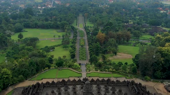 Magnificent ancient Borobudur Buddhist temple, Java, Indonesia, aerial dolly out