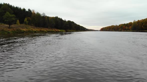 Aerial View. Flying Over the River. Beautiful Autumn Day