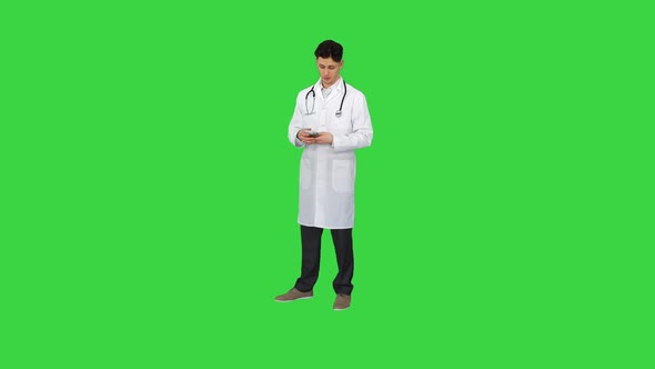 Doctor Counting Euro and Dancing on a Green Screen, Chroma Key.