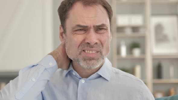 Tired Senior Old Businessman with Neck Pain