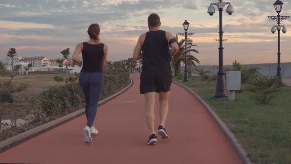 Man and Woman Running