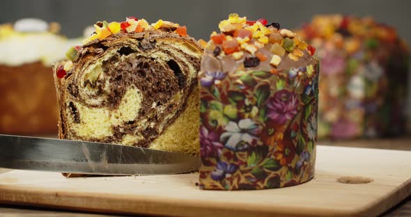 Easter Cake Is Decorated With Icing, Candied Fruit, Nuts And Chocolate