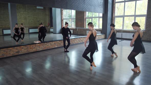 Attractive Dancers Finishing Lesson in Dance Hall