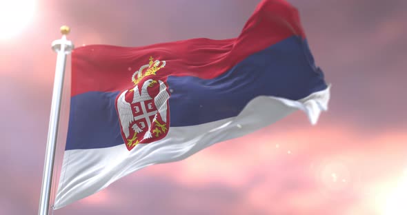 Flag of Serbia at Sunset