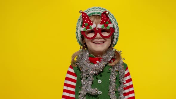 Kid Girl in Christmas Elf Santa Helper Costume Dancing Fooling Around