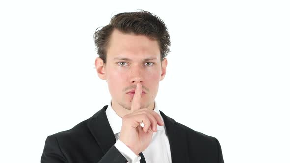 Silence Shut Your Mouth Finger on Lips of Businessman