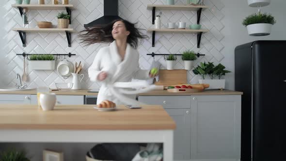 Girl Dancing in Kitchen 