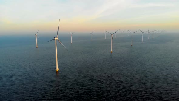 Windmill Park in the Ocean Drone Aerial View of Windmill Turbines Generating Green Energy Electric