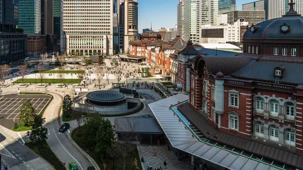 time lapse of Tokyo station, a railway station in the Marunouchi business district in Tokyo, Japan