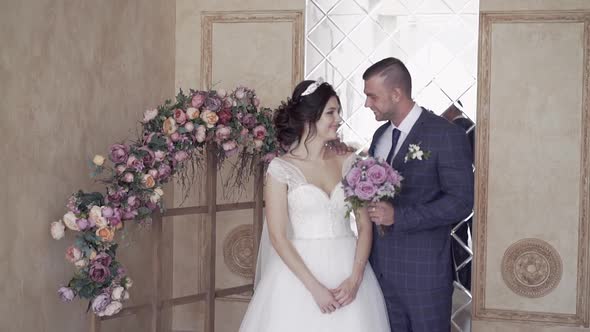 Slow Motion Handsome Fiance Hugs and Kisses Pretty Bride