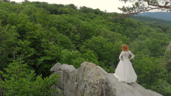 Aerial Footage Bride is on the Edge of the Abyss