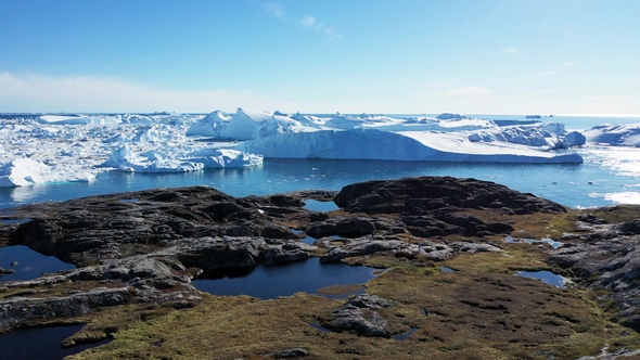 Environment.Greenland. Icebergs. Nature and landscapes of Greenland. Climate change, global warming.