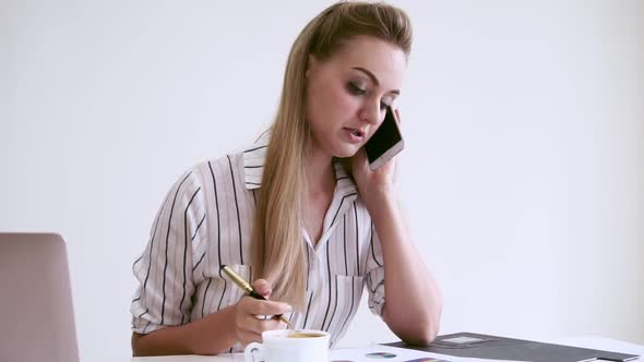 Blonde Business Woman Working at Modern Office