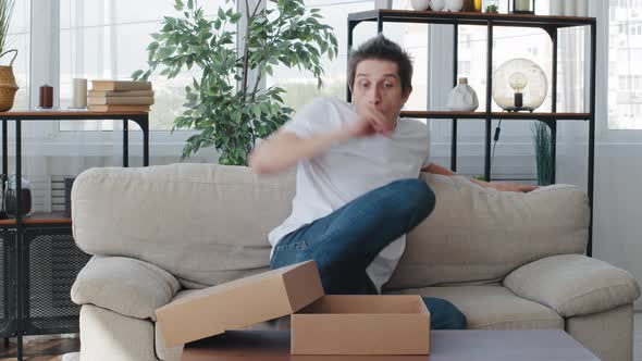 Caucasian Adult Male Buyer Customer Millennial Man Receives Parcel From Delivery Order Cardboard Box