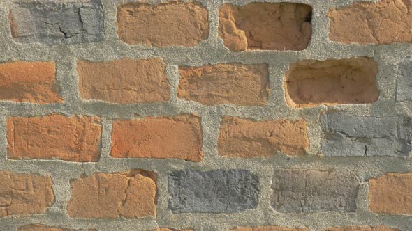 Brick wall details 4K 2160p UHD video - Bricks in the wall lighted 4k 3840X2160 UHD footage