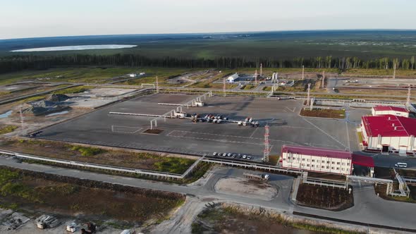 A Drone Flight Over an Industrial Base Deep in Siberia, a Large Parking Lot for Specialized Vehicles
