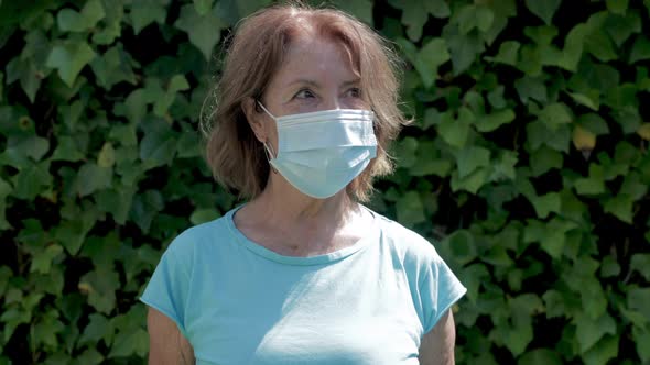 Mature Woman Wearing Protective Face Mask