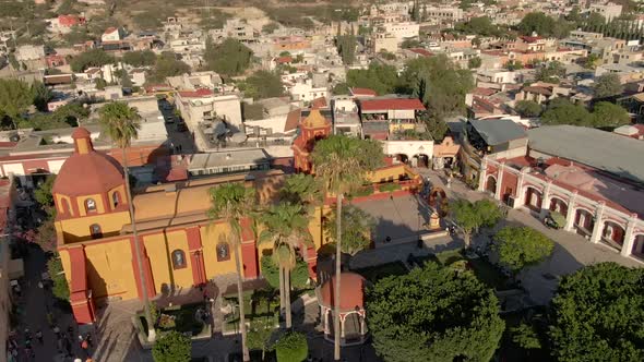 Hyper-lapse of San Sebastian Church In The Colonial Village Of Bernal, Queretaro, Mexico - aerial or